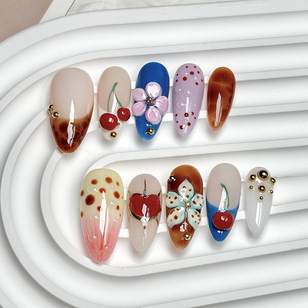 CTTHNBD almond press-on nails with cherry flower heart design for a chic winter look.