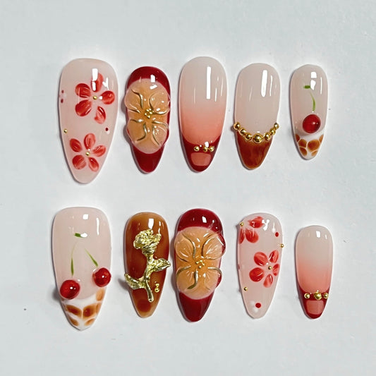 CTTHNBD press-on nails featuring a 3D gold flower design for luxe detail.