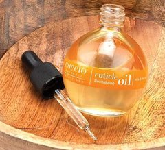 Cuccio Cuticle Oil application on cuticles providing deep moisture and nourishment