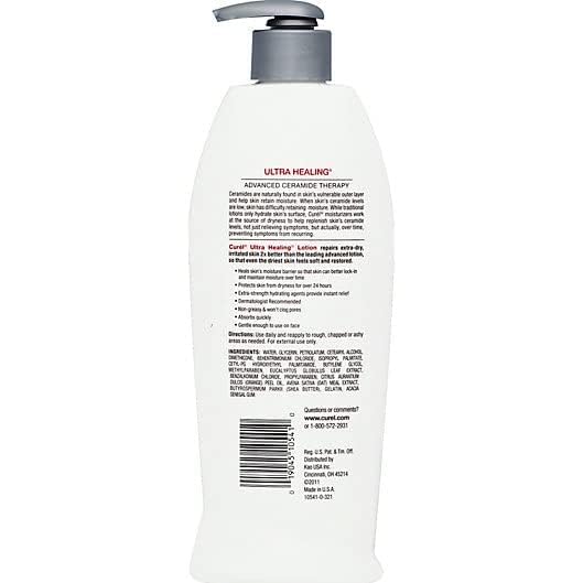 Hand applying Curel Ultra Healing Lotion to rough areas for deep hydration