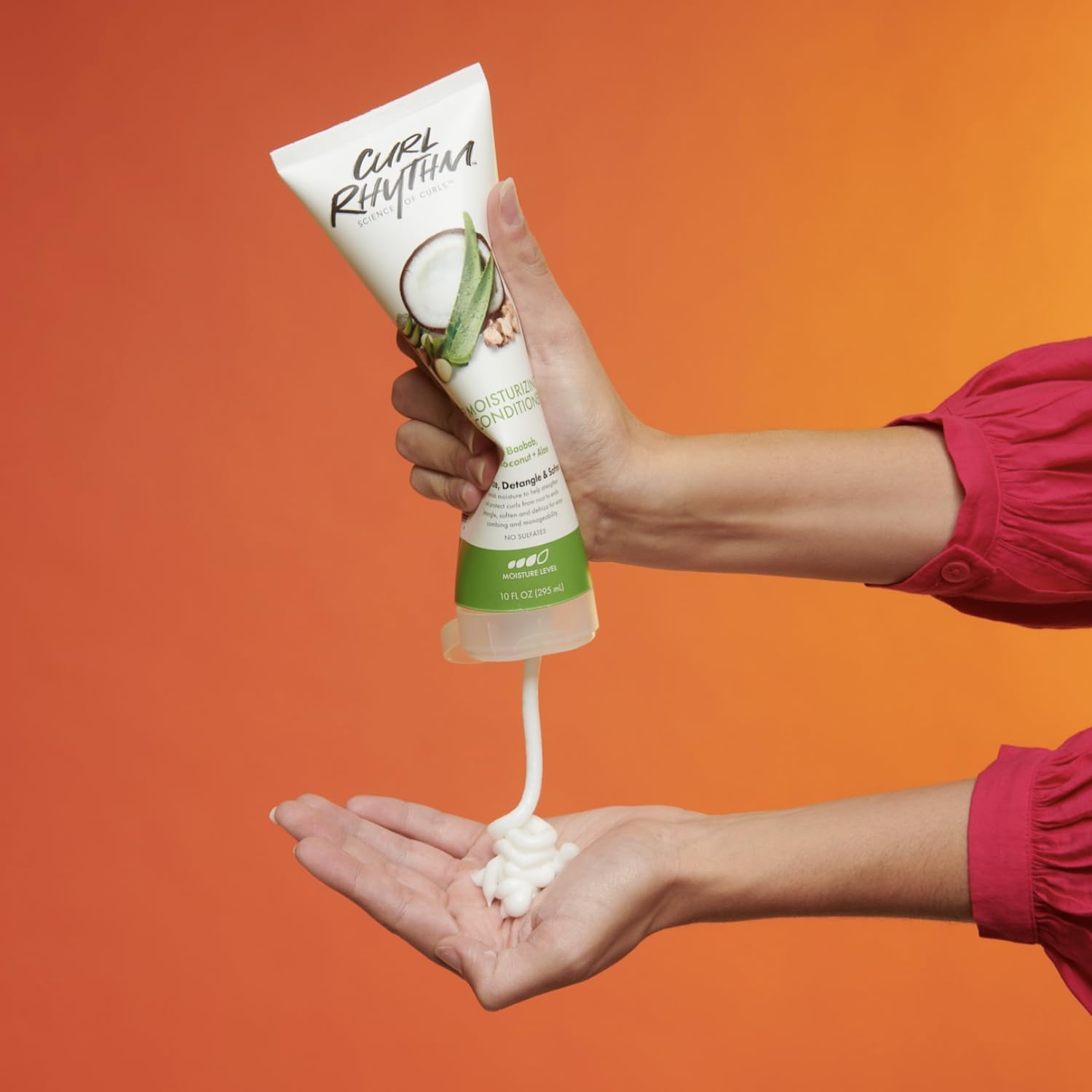 Curl Rhythm natural ingredients like shea, coconut, and aloe in the conditioner bottle.