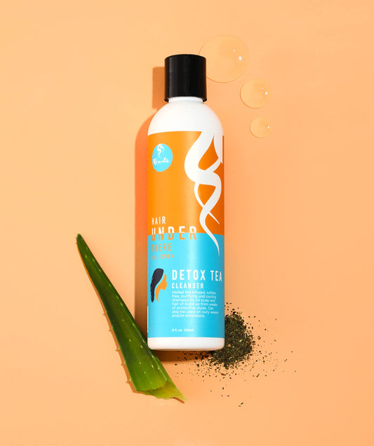 CURLS Detox Tea Shampoo lather on scalp provides purifying cleanse during wash.
