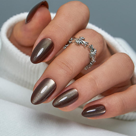 CurvLife Bronze MoCa cat eye nails collection in medium almond for chic everyday wear.