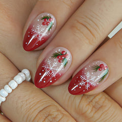 CurvLife hand model nails wearing red French snowflake tips