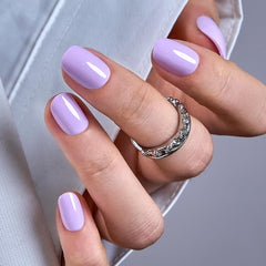 CurvLife oval press-on nails short close-up showing natural fit and glossy finish.