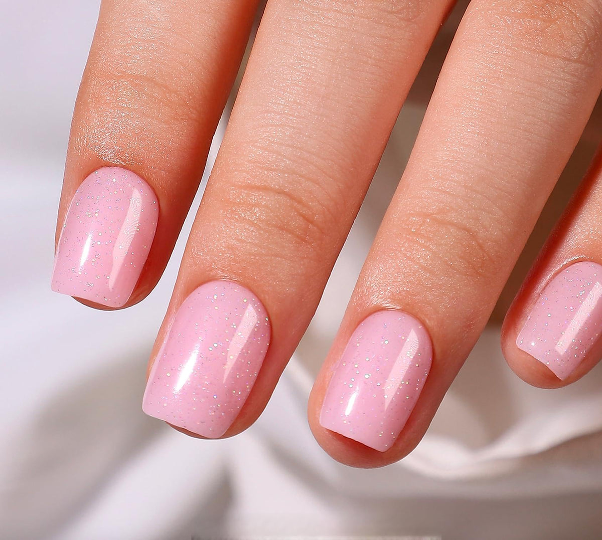 CurvLife pink-stardust press-on nails deliver salon-quality finish at home.