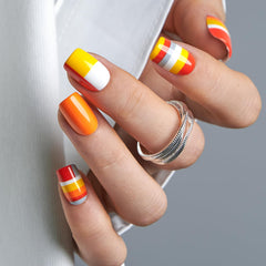 CurvLife soft gel nails in natural fit resting along the cuticle for a seamless look.