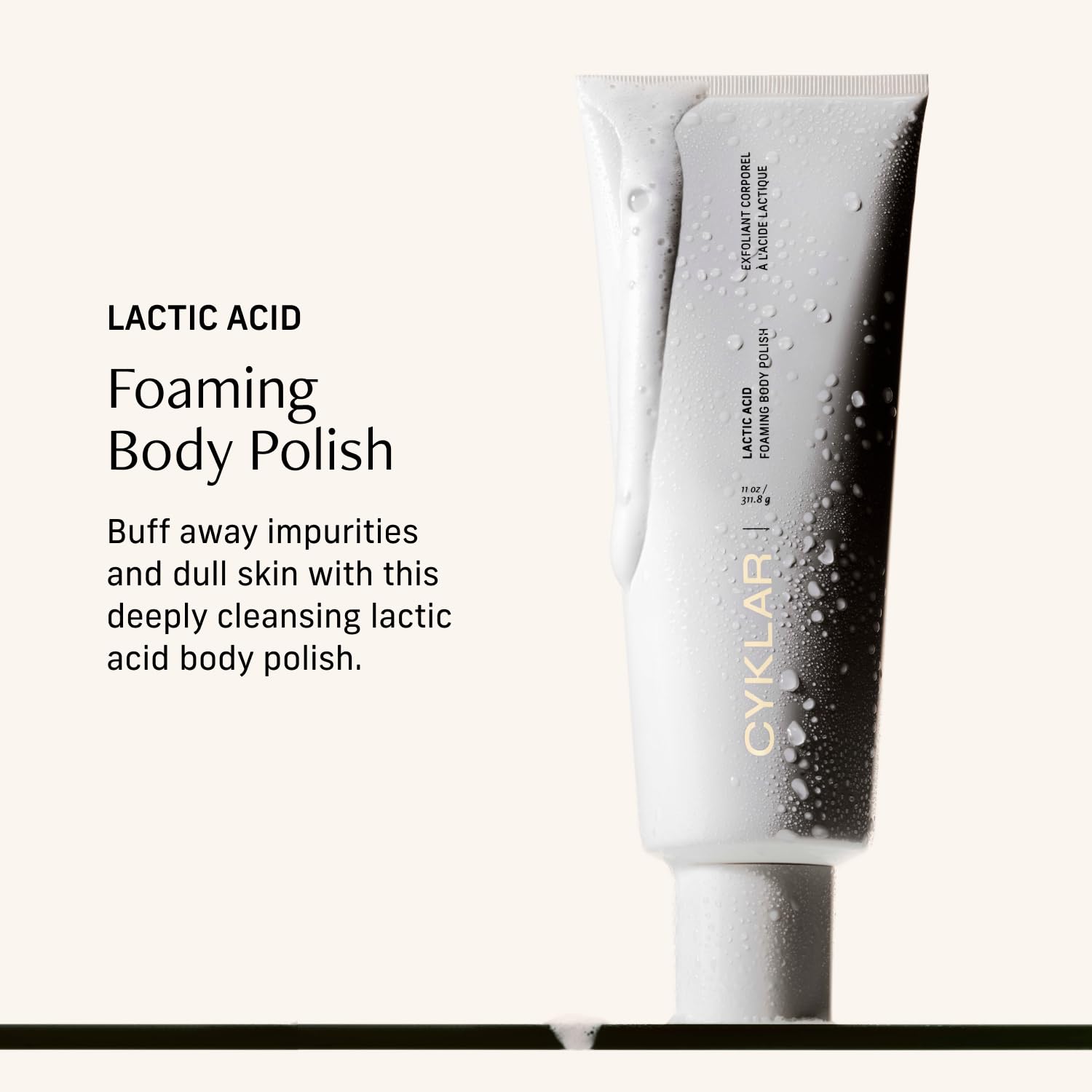 CYKLAR Lactic Acid Body Polish textured cream application demonstrates smoothing exfoliation.