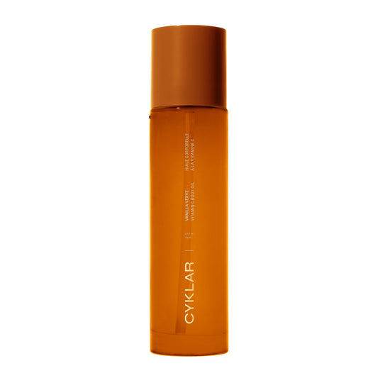 CYKLAR Vitamin C Body Oil Vanilla Verve bottle glows softly, providing hydrated skin.
