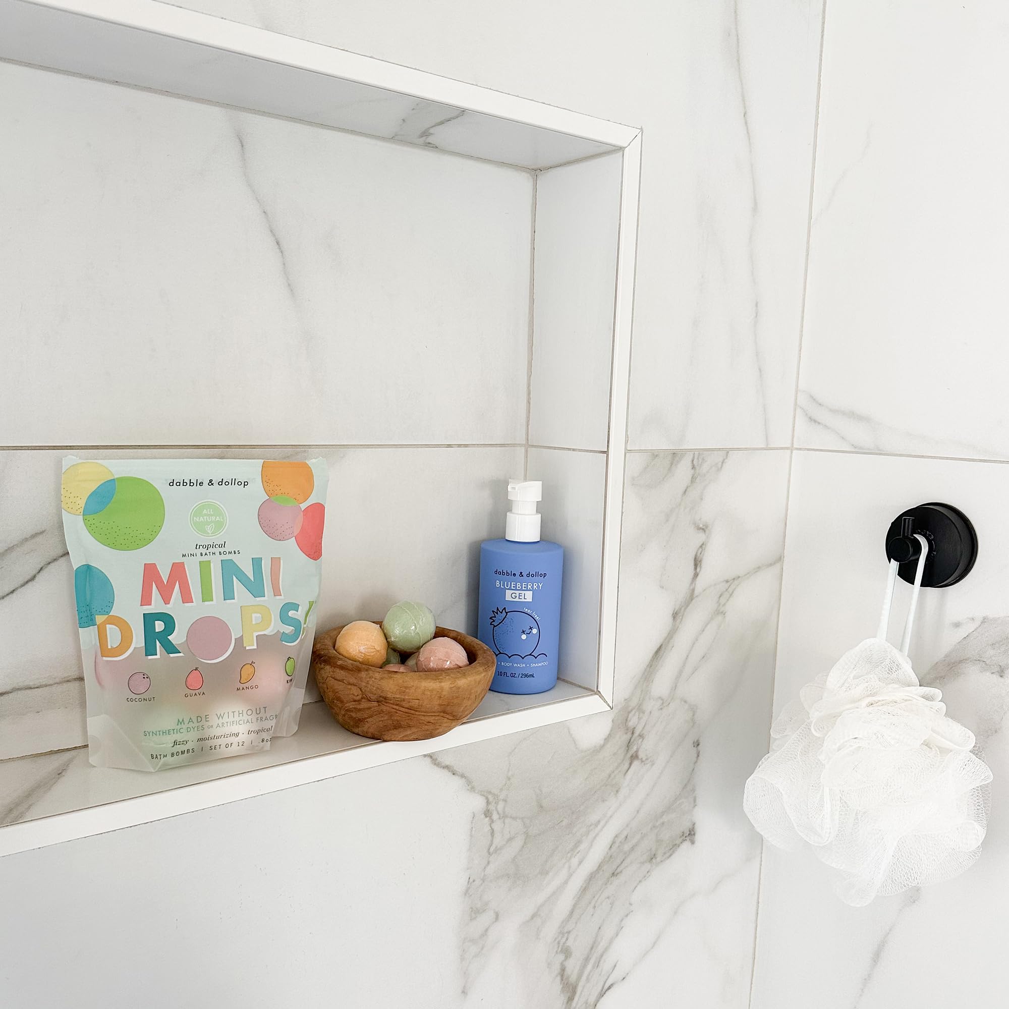 Dabble & Dollop droplets in tub fizz and entertain little bath time.