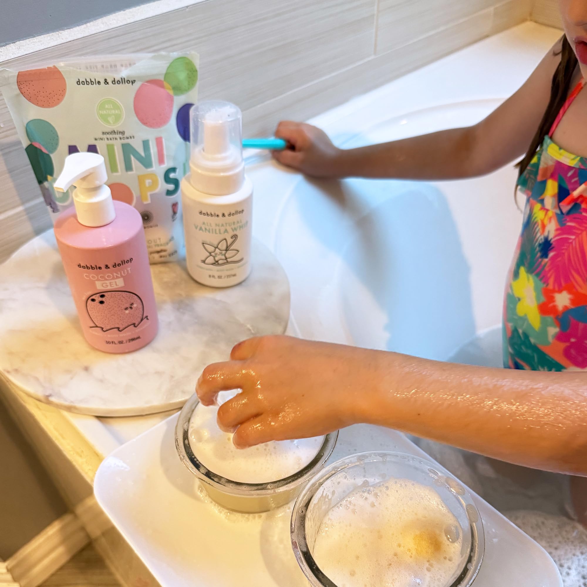 Dabble & Dollop rose bombs introduce floral fragrance to bath routines.