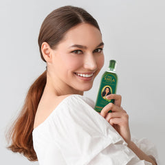 Dabur Amla Hair Oil celebrity endorsement context implies trusted heritage.