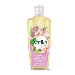 Dabur Vatika Enriched Hair Oil garlic bottle nourishes from root to tip.