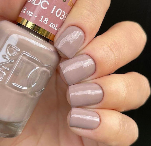 DAISY DND Bamboo Brown 103 lacquer bottle for a complementary nail finish.