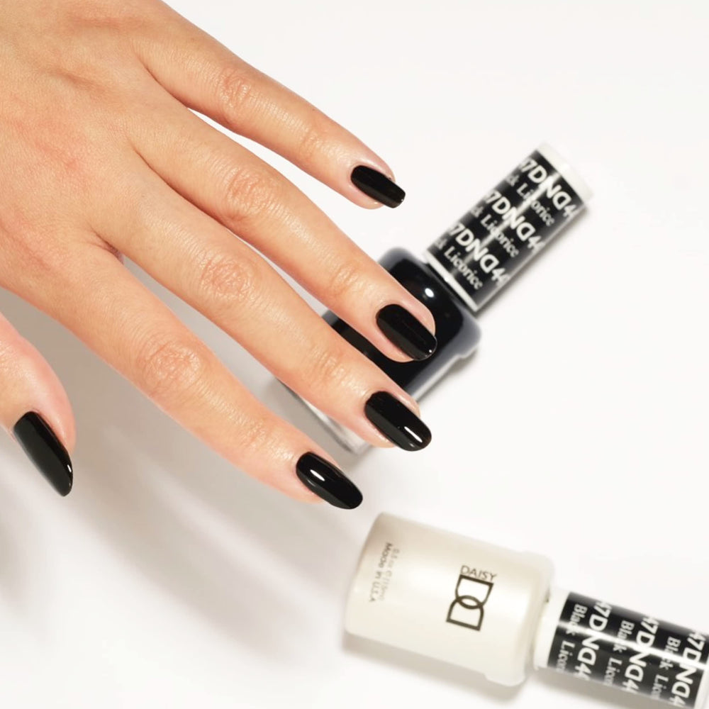 DAISY DND Black Licorice lacquer bottle for a cohesive nail color.