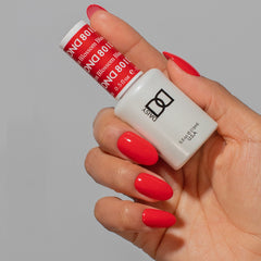 Daisy DND Blossom lacquer bottle highlights a matching red finish for salon-worthy nails.