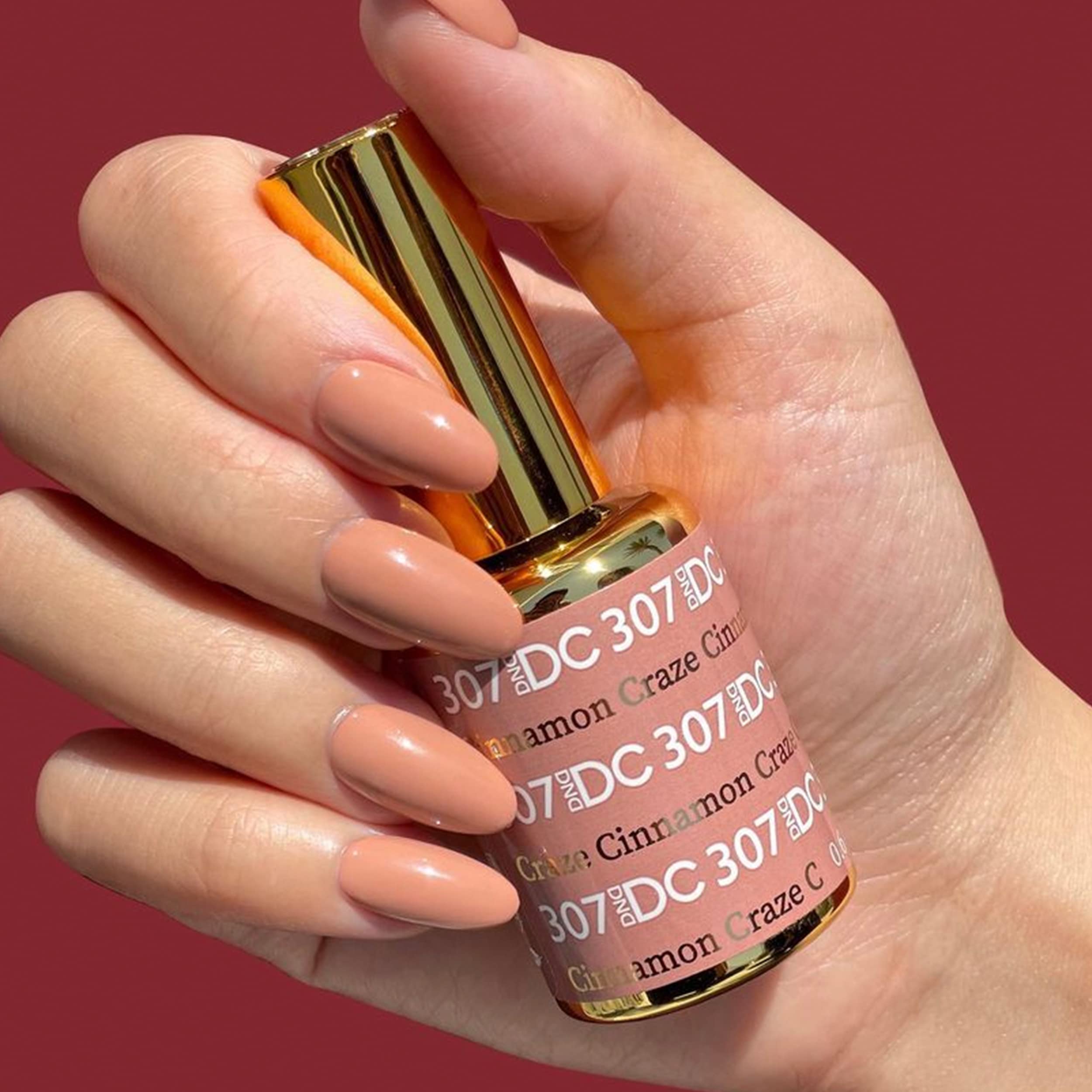 DAISY DND Cinnamon Craze lacquer in a matching shade for a seamless finish.