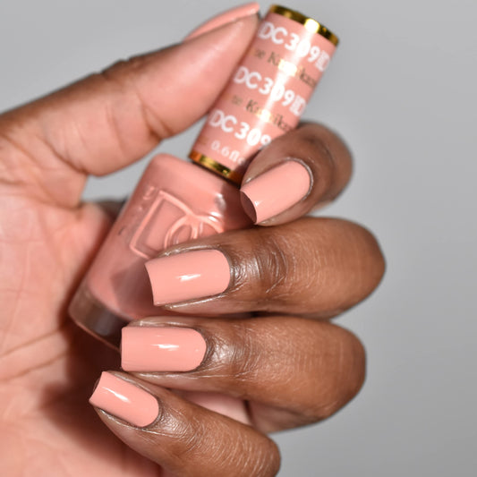 DAISY DND Kamikaze lacquer bottle paired with gel polish for a durable, chip-free finish