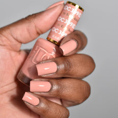 DAISY DND Kamikaze lacquer bottle paired with gel polish for a durable, chip-free finish