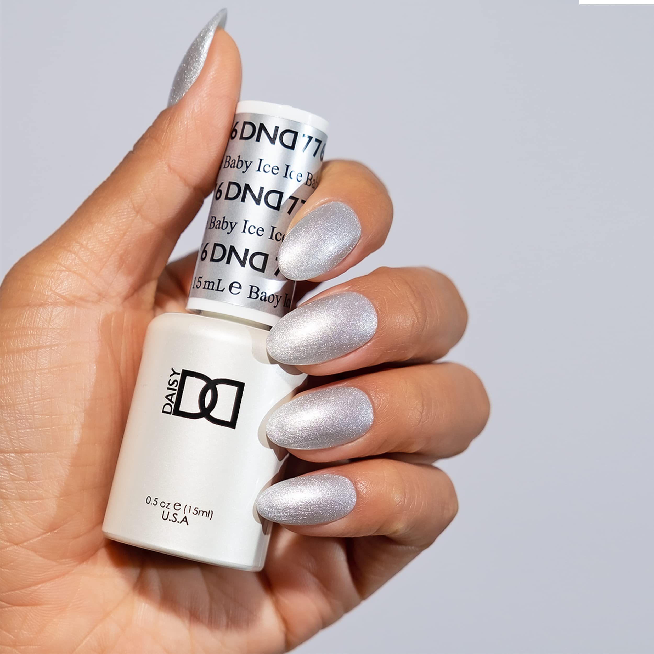 DAISY DND Ice Ice Baby lacquer bottle paired for a matching at-home manicure.