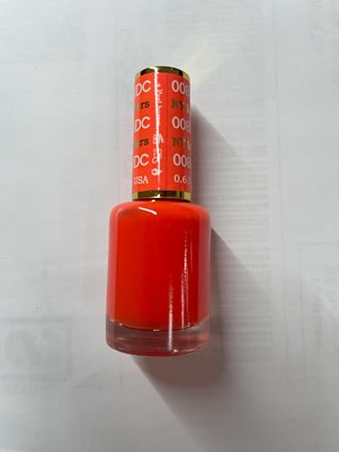 DAISY DND nails with glossy orange polish demonstrating vibrant shine.