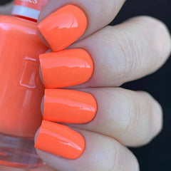 Daisy DND Orange Collection lacquer—vibrant, chip-resistant finish.