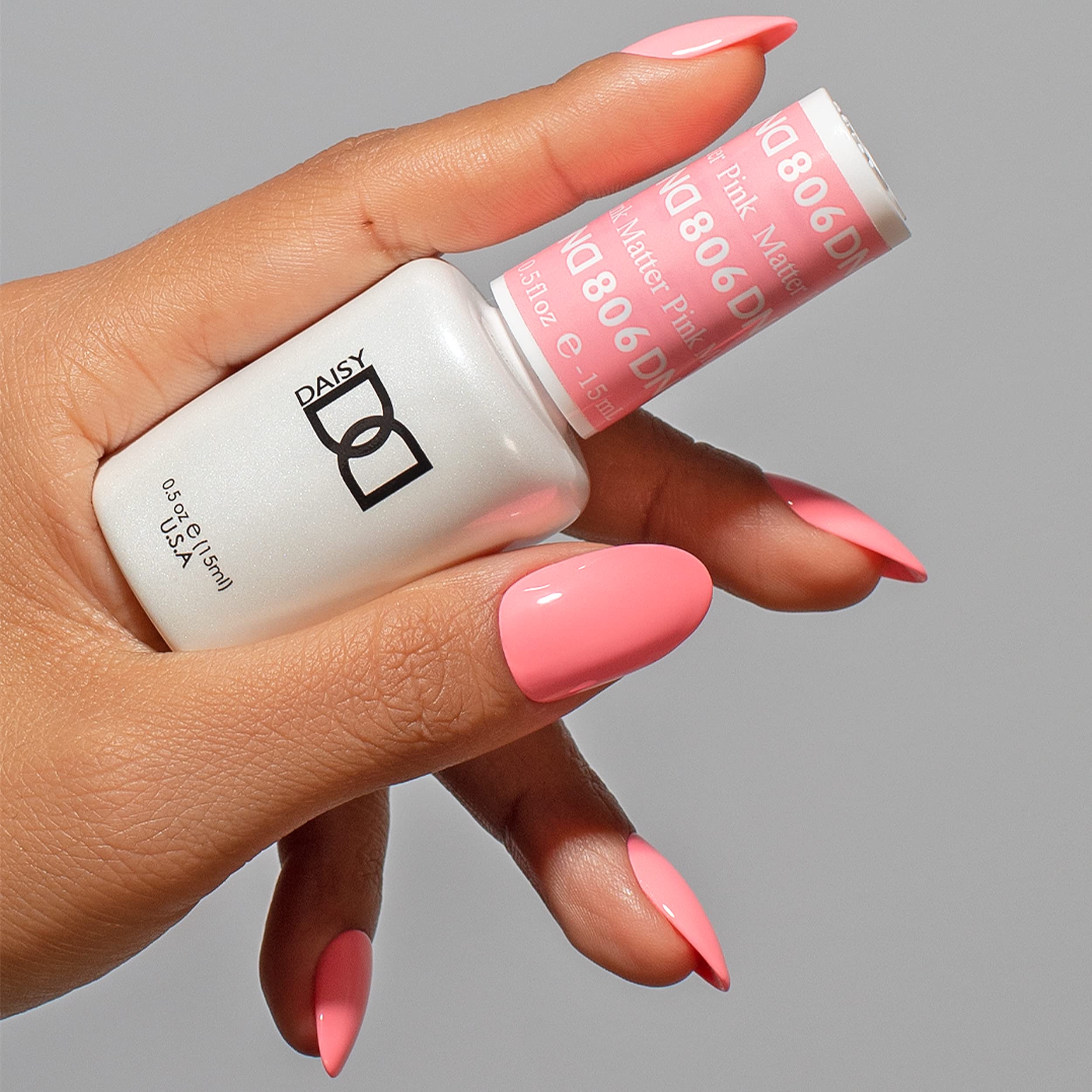 DAISY DND Pink Matter lacquer bottle close-up highlighting glossy air-dry finish.
