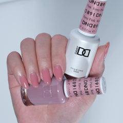 Daisy DND Rosy Pink lacquer bottle shows quick removal in minutes
