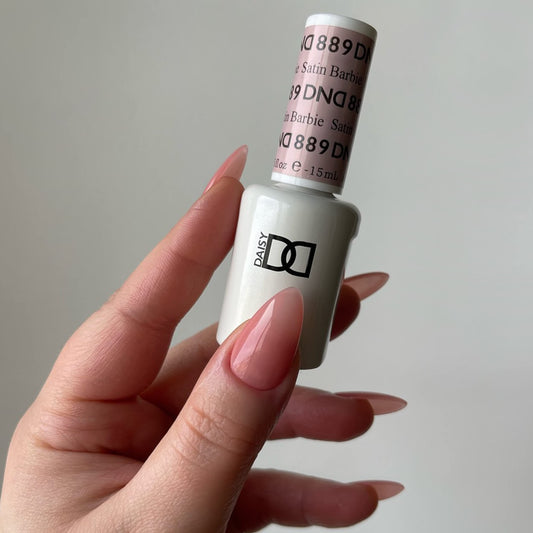 Daisy DND Satin 889 lacquer bottle showing matching sheer color for chip-free finish.