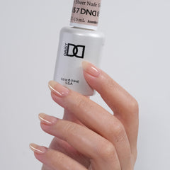 DAISY DND Sheer Nude 857 brush-stroke close-up for smooth application.