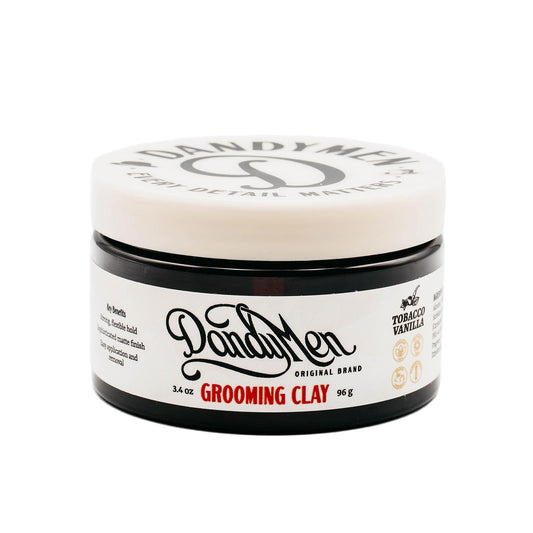 DandyMen Grooming Clay strong hold image emphasizing all-day style control.