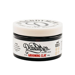 DandyMen Grooming Clay strong hold image emphasizing all-day style control.