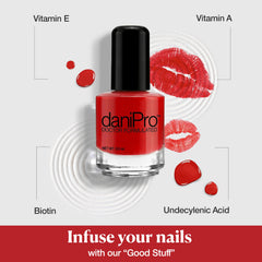 nail being painted with daniPro First Kiss glossy red finish