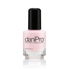 DaniPro Love is All pink nail polish bottle front showing soft pink shade for everyday wear.