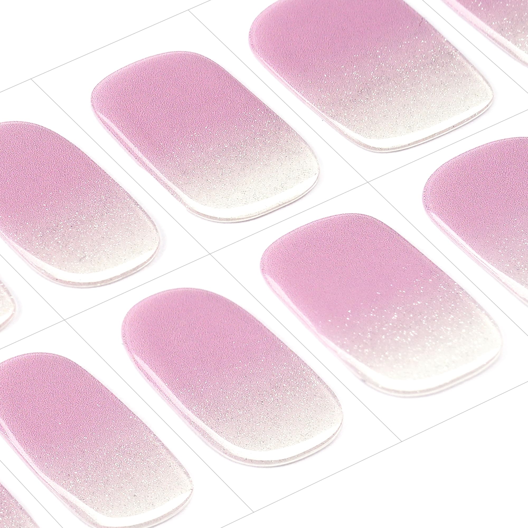 Close-up of lavender gradient design with fine glitter on gel wraps.