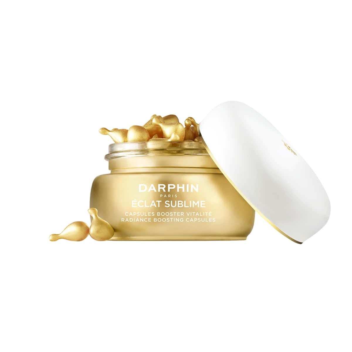 Close-up of Darphin Éclat Sublime capsules featuring Pro-Vitamin C and E.