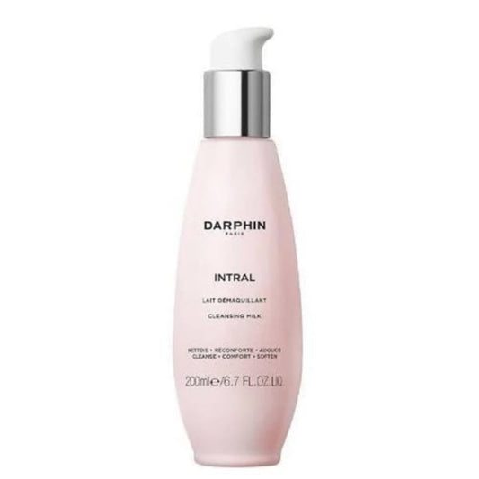 Darphin INTRAL Cleansing Milk bottle being poured for gentle cleansing and makeup removal