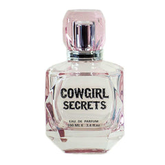 Close-up of the Cowgirl Secrets bottle for evenings out and mood.