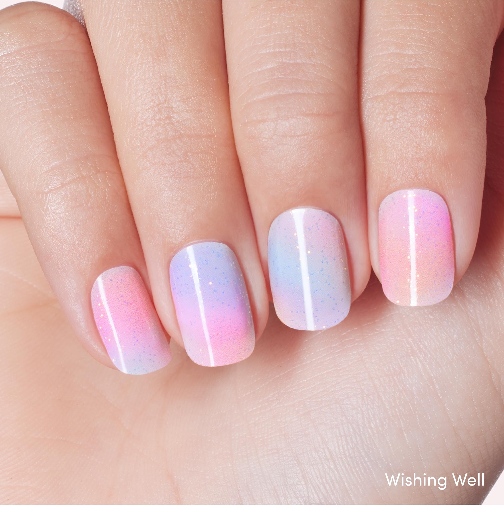 Dashing Diva Glaze Iridesci strip packaging close‑up showing gloss.
