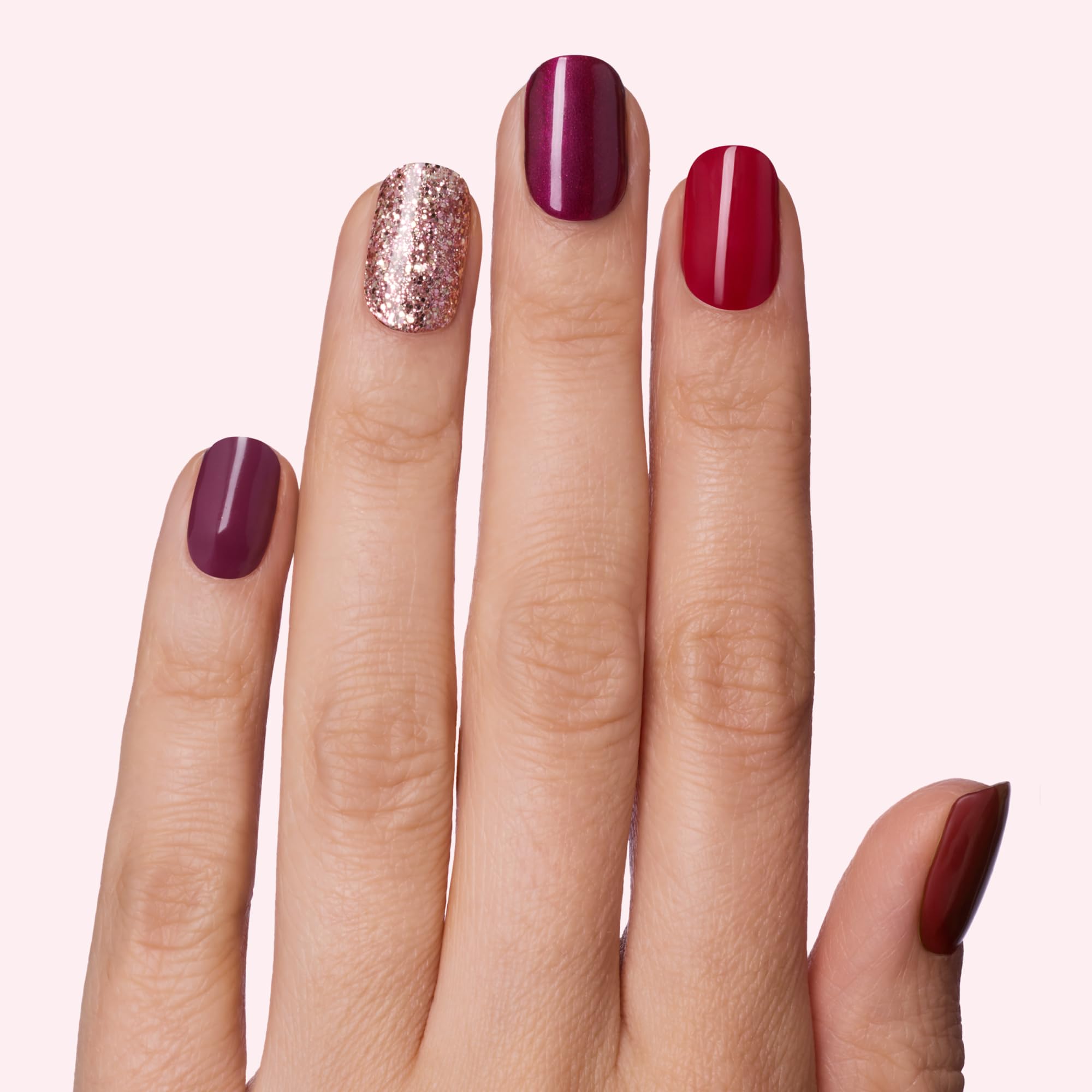 Applying Dashing Diva Gloss nail strip for a fast salon-style look
