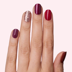 Applying Dashing Diva Gloss nail strip for a fast salon-style look