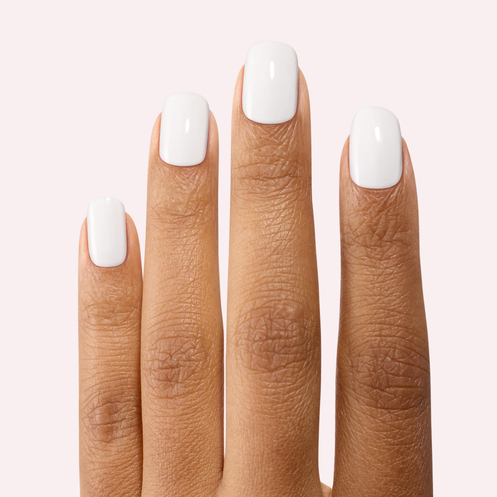 Dashing Diva Gloss Daikon packaging with crisp white visuals for versatile styles.