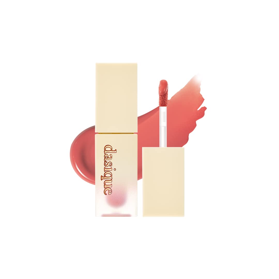 dasique Cream de butter Tint 02 Salted Butter bottle close-up showing warm coral beige tone.