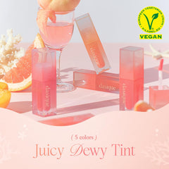 Close-up of the Juicy Dewy Tint wand applying pink peach color.