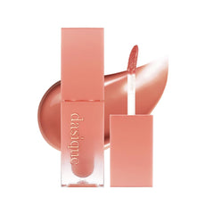 Dasique Juicy Dewy Tint Bare Nude cap close-up showing natural nude shade and hydrating shine.