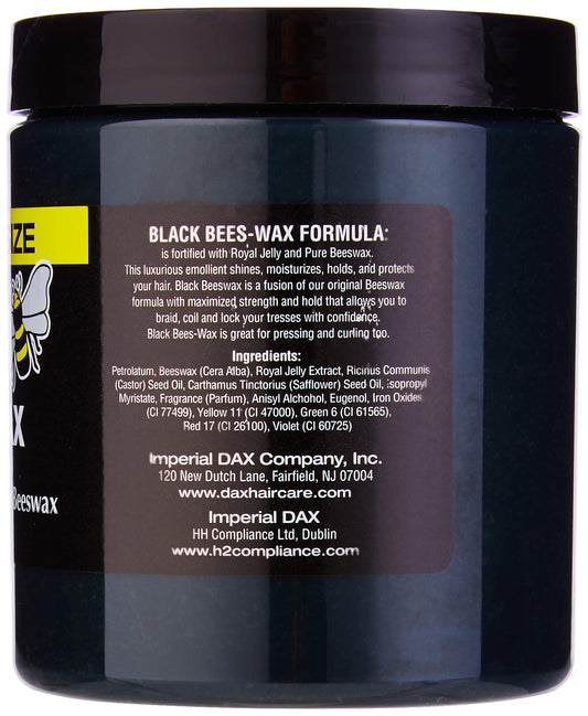 Close-up of DAX Roots Olive Cream texture ready to nourish and soften hair.