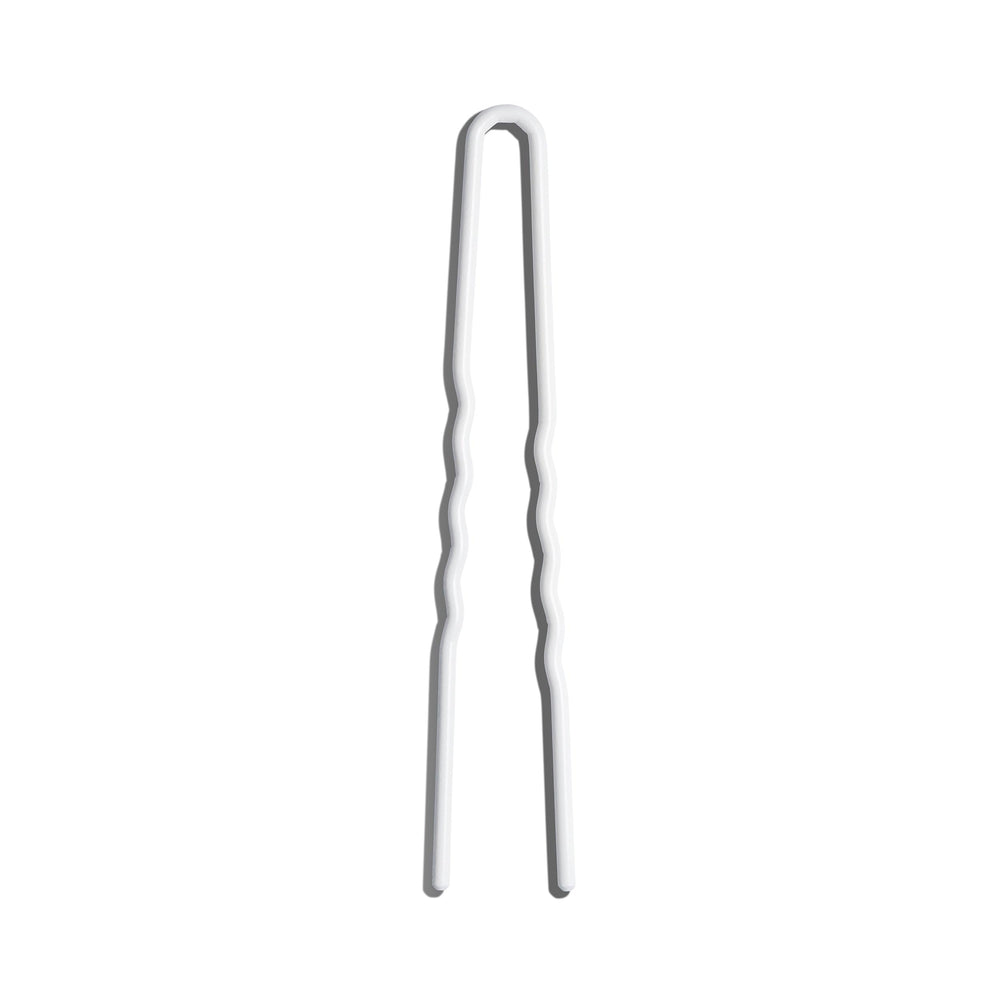 Day Rate Beauty Petite Power Pin chignon scene with stable support.