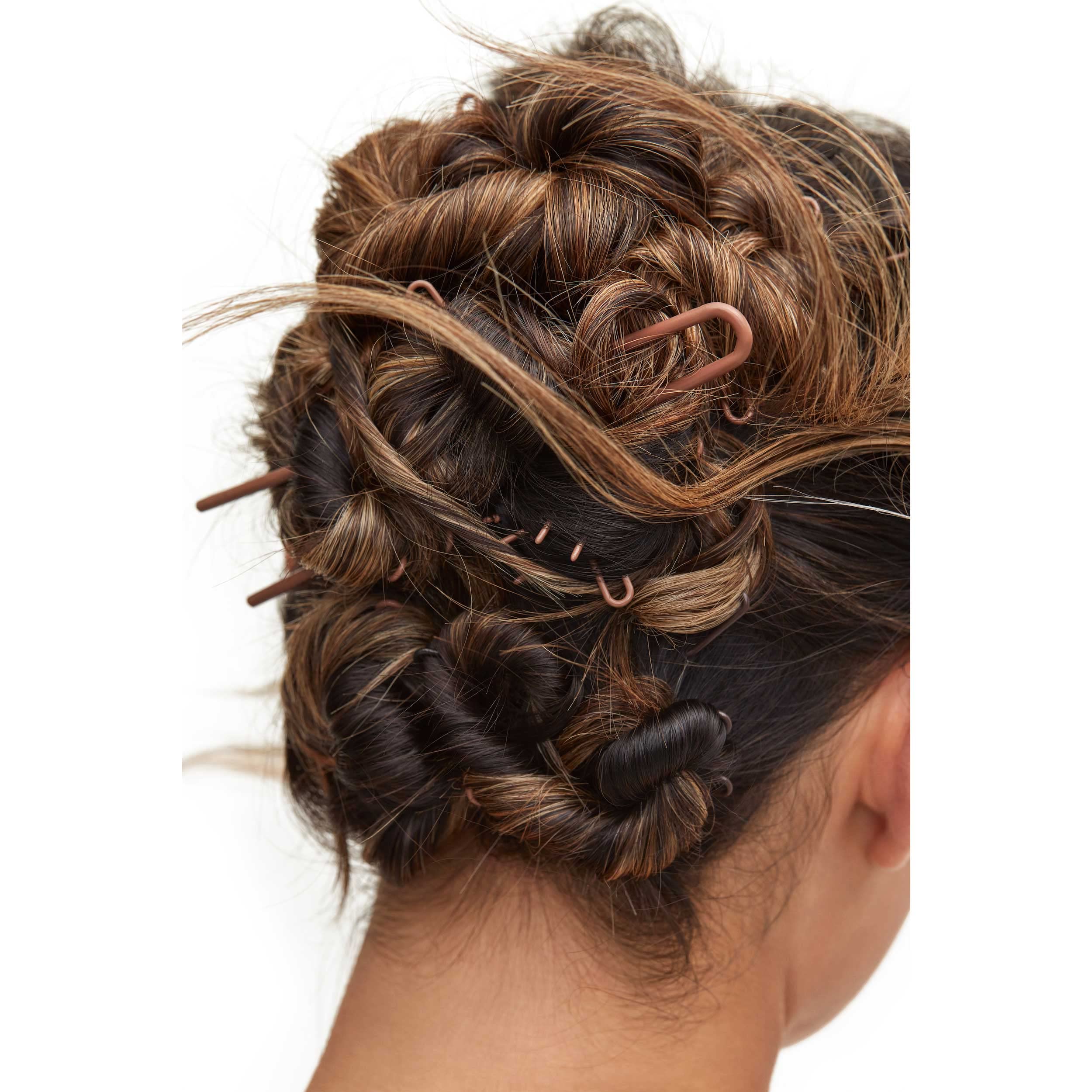 Day Rate Beauty Petite Power Pin in use to secure a bun