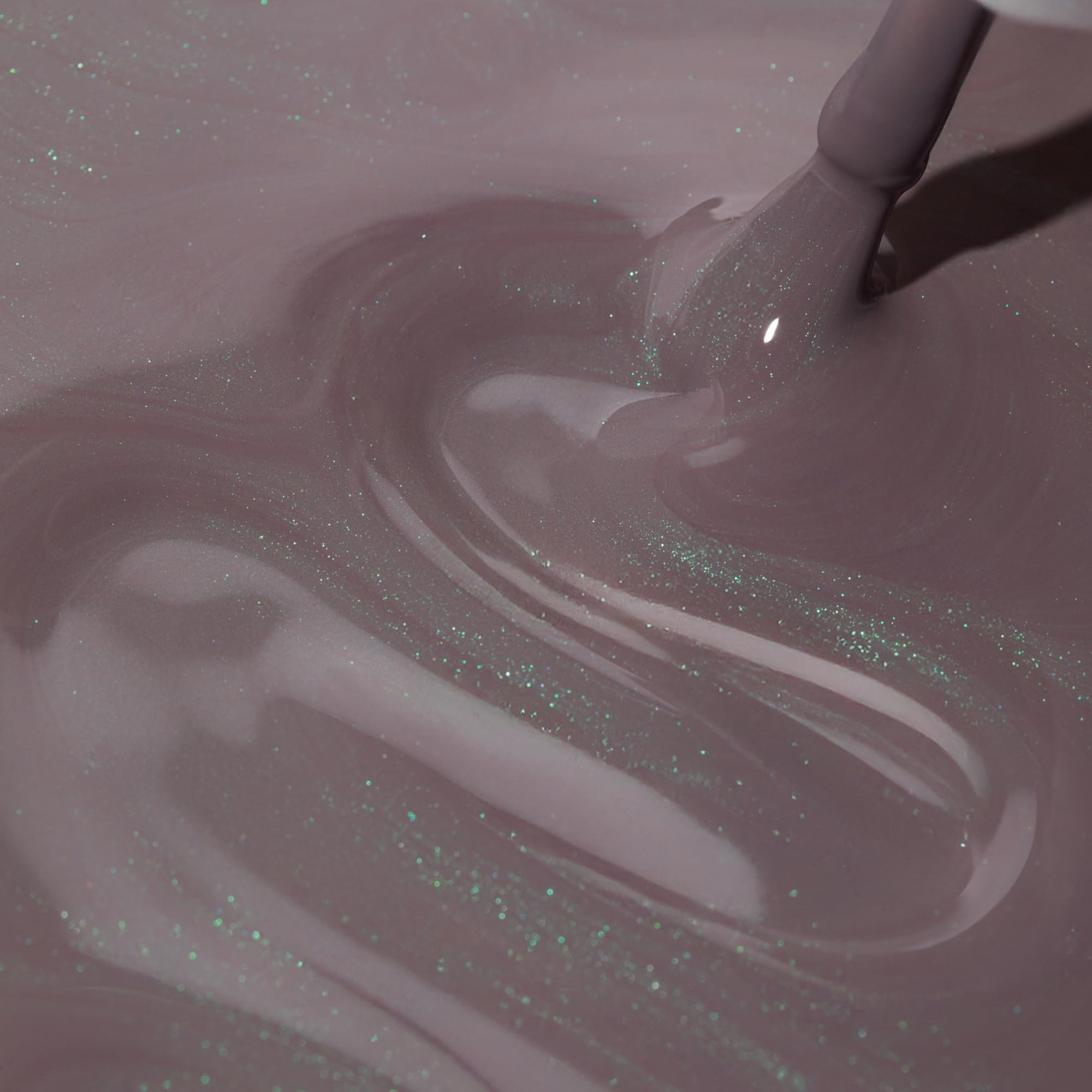Dazzle Dry Lets Glow semi-sheer finish reveals purple taupe with green shimmer.