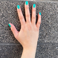 Dazzle Dry Step3 nail lacquer semi-sheer cream app focuses on precise brush strokes.